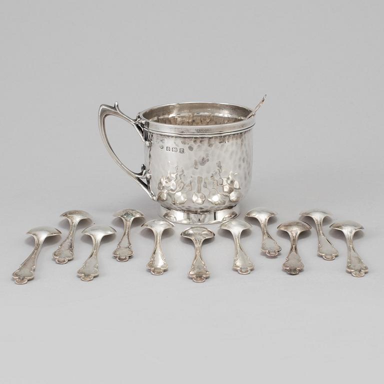 a silver cup by The Alex Clark Company, London, around 1800/1900 and 12 Swedish silver spoons from 1968. W 280 g.