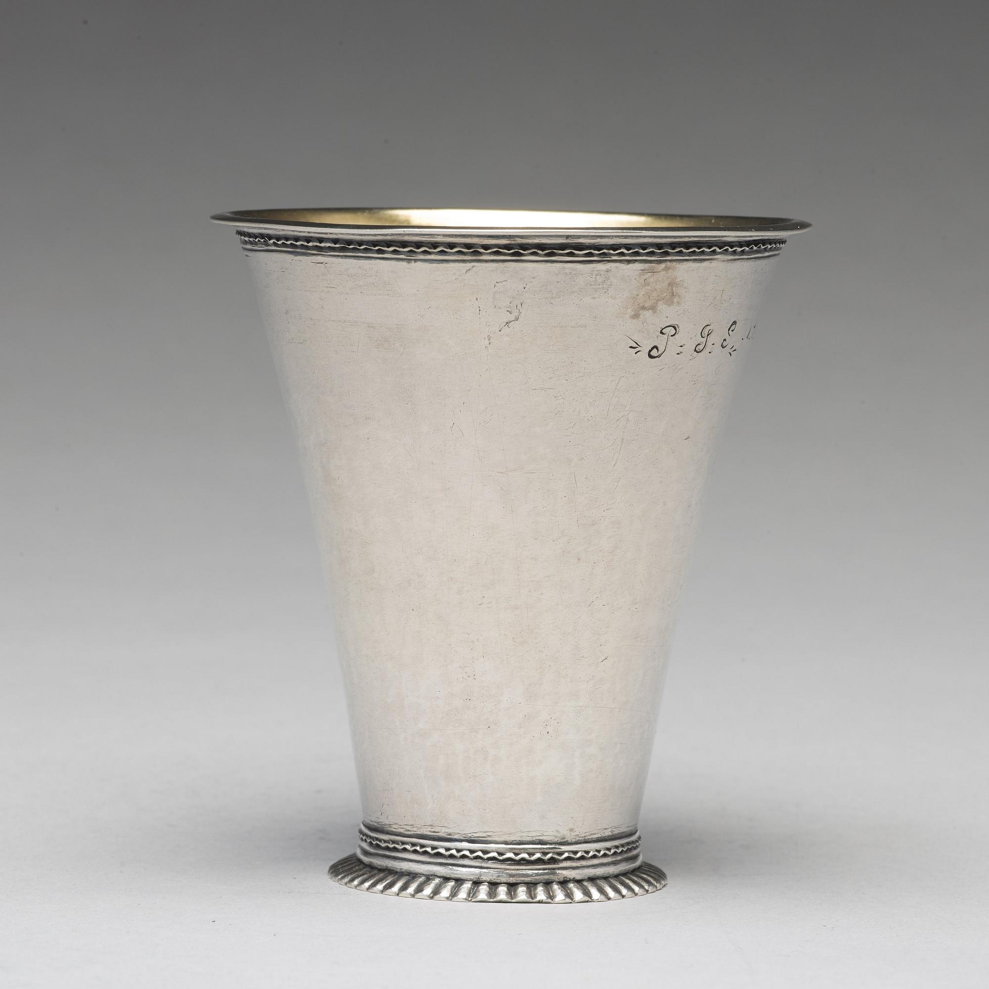 A Swedish 18th century parcel-gilt silver beaker, mark of Lars Castman, Vimmerby 1740's.