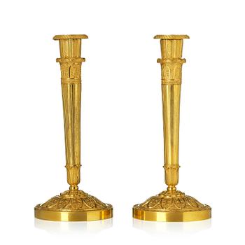178A. A pair of Empire ormolu candlesticks.