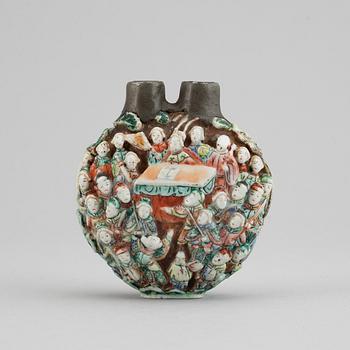 A famille rose moulded snuff bottle, Qing dynasty, 19th century.