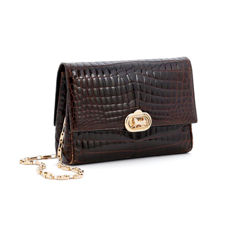 CÉLINE, a brown crocodile evening bag / shoulder bag with  shoulder strap.