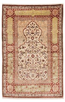 356. A semi-antique Turkish silk rug, c. 200 x 130 cm.