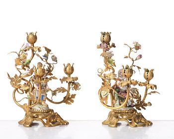 A pair of Meissen Rococo-style three-light candelabra, second half of the 1800's.