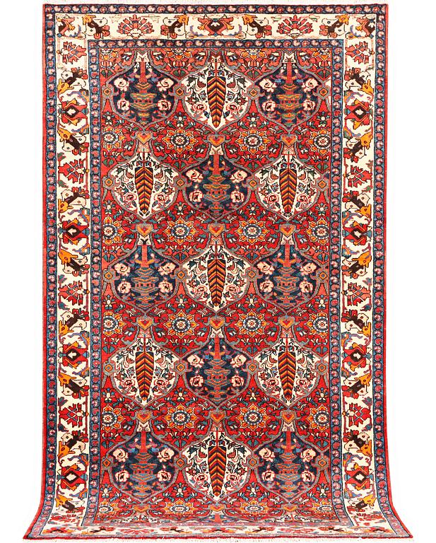 A Hamadan carpet, c. 335 x 184 cm.