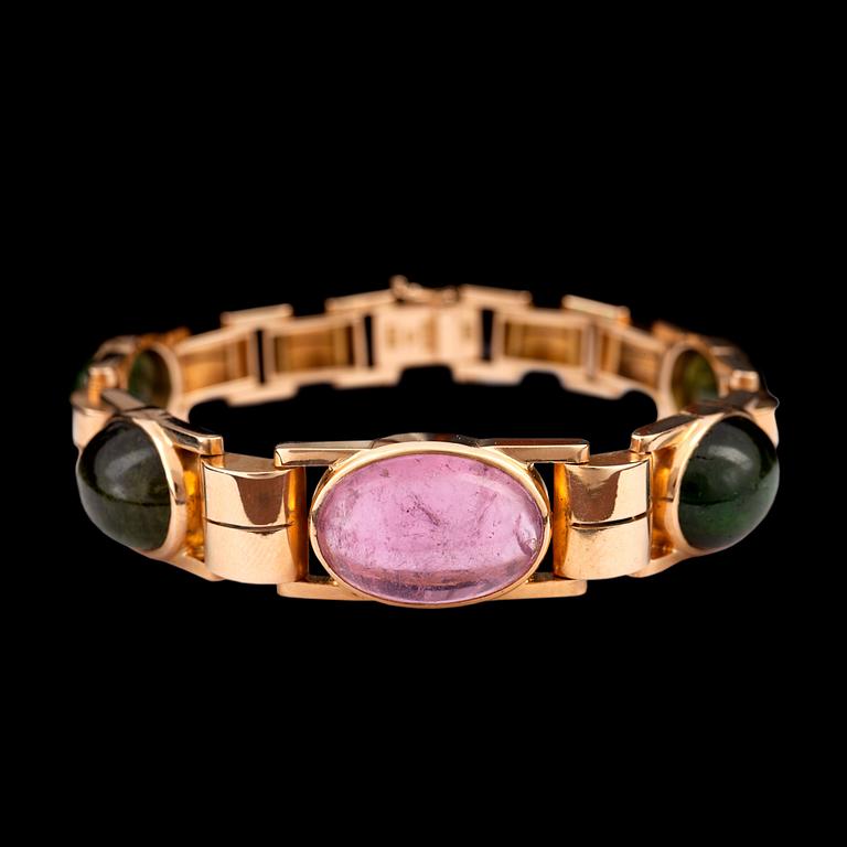 A pink and green tourmaline bracelet.