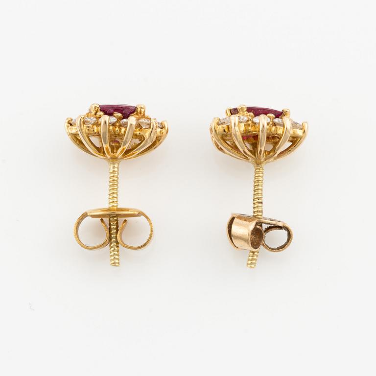Earrings, a pair in carmosé style, with rubies and brilliant-cut diamonds.