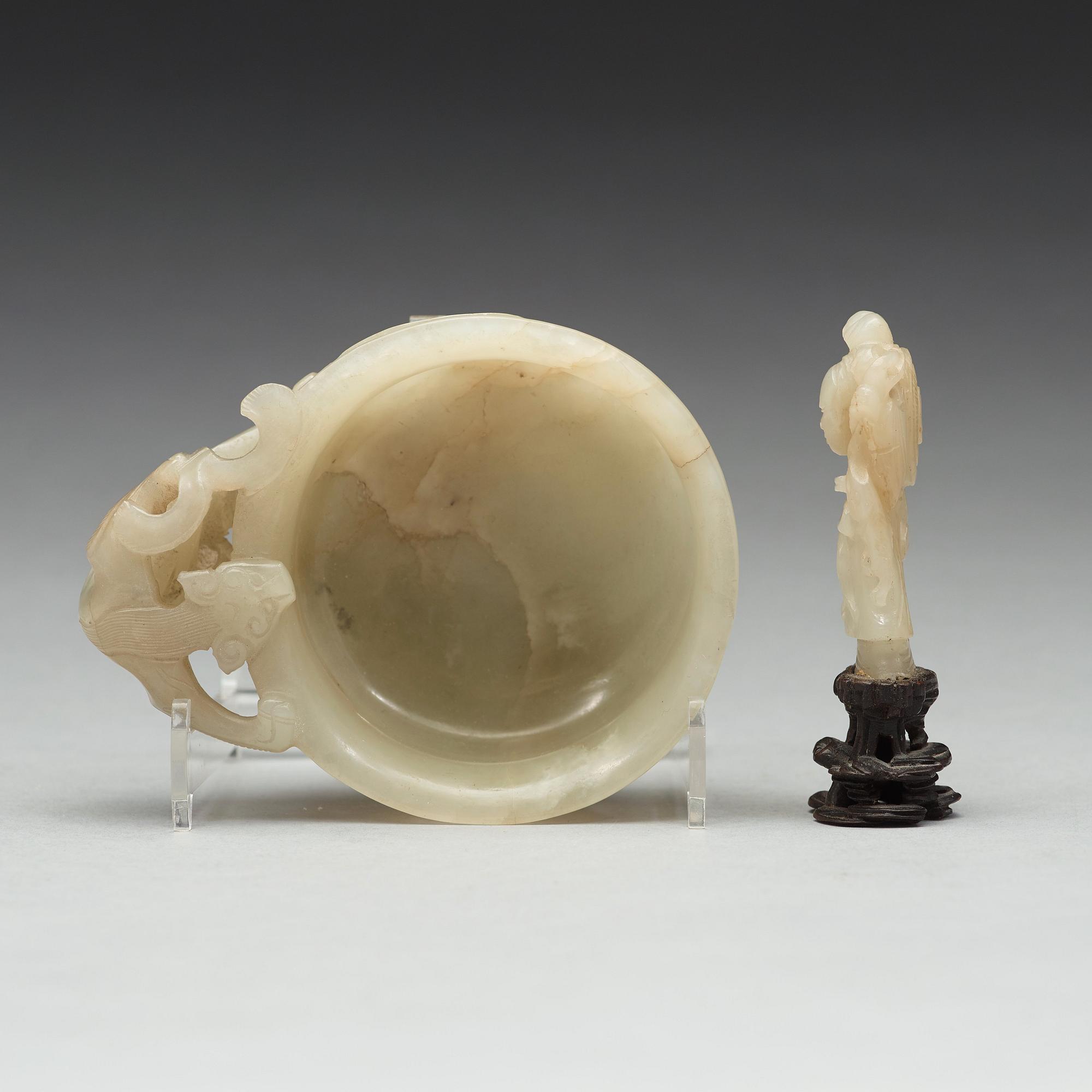 A nephrite cup and figurine, China, early 20th Century.