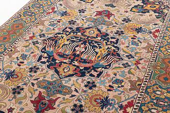 An antique Tabriz carpet, c. 271 x 175 cm.