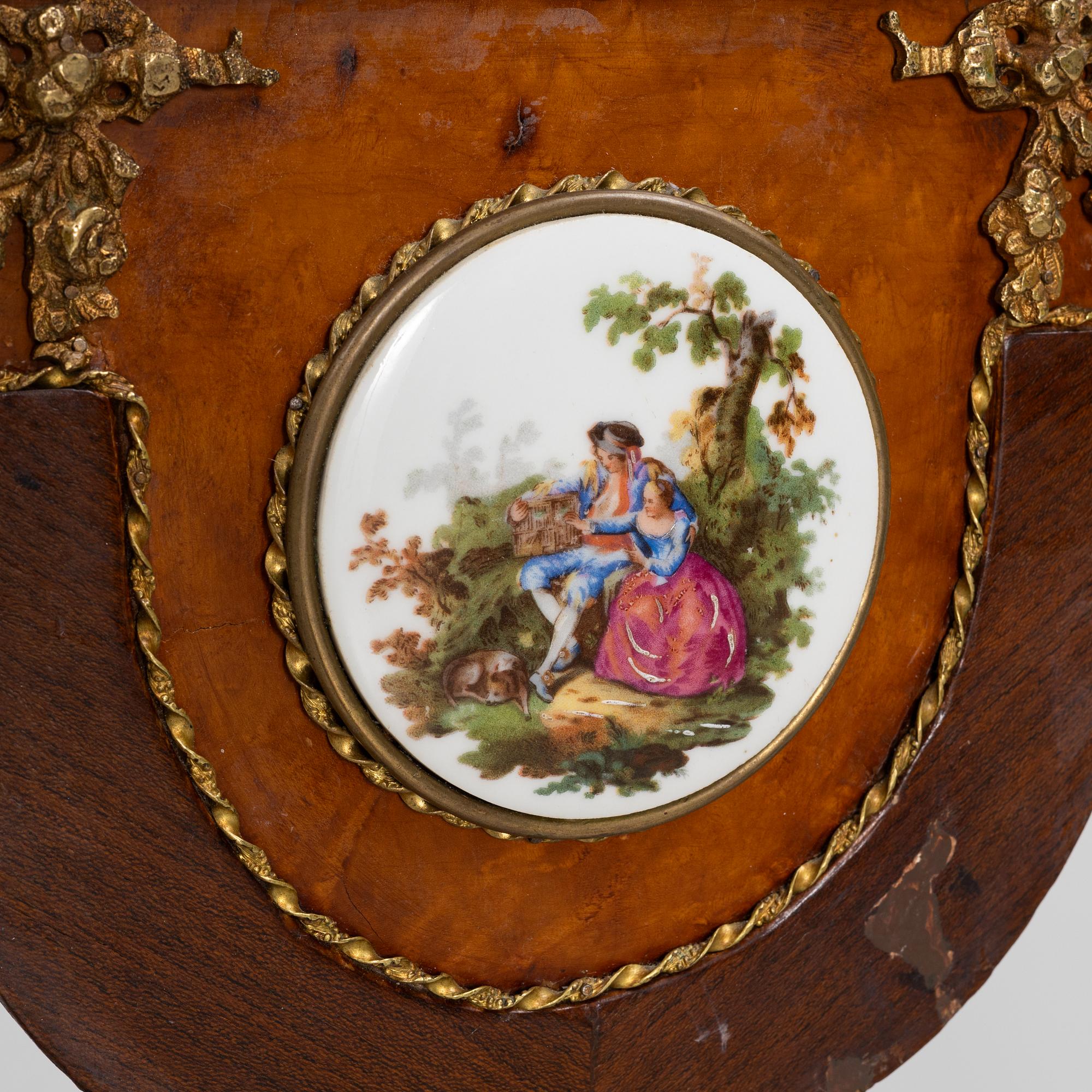 A Louis XVI-style gilt-brass mounted console table, circa 1900.