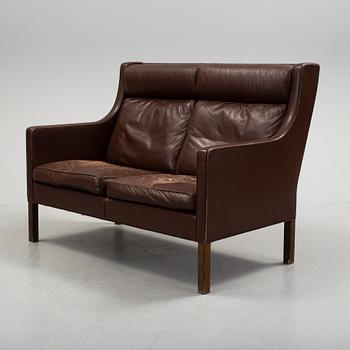 A two-seat leather sofa by Børge Mogensen for Fredrika Stolefabrik, Denmark.