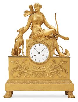 579. A French Empire early 19th century mantel clock.