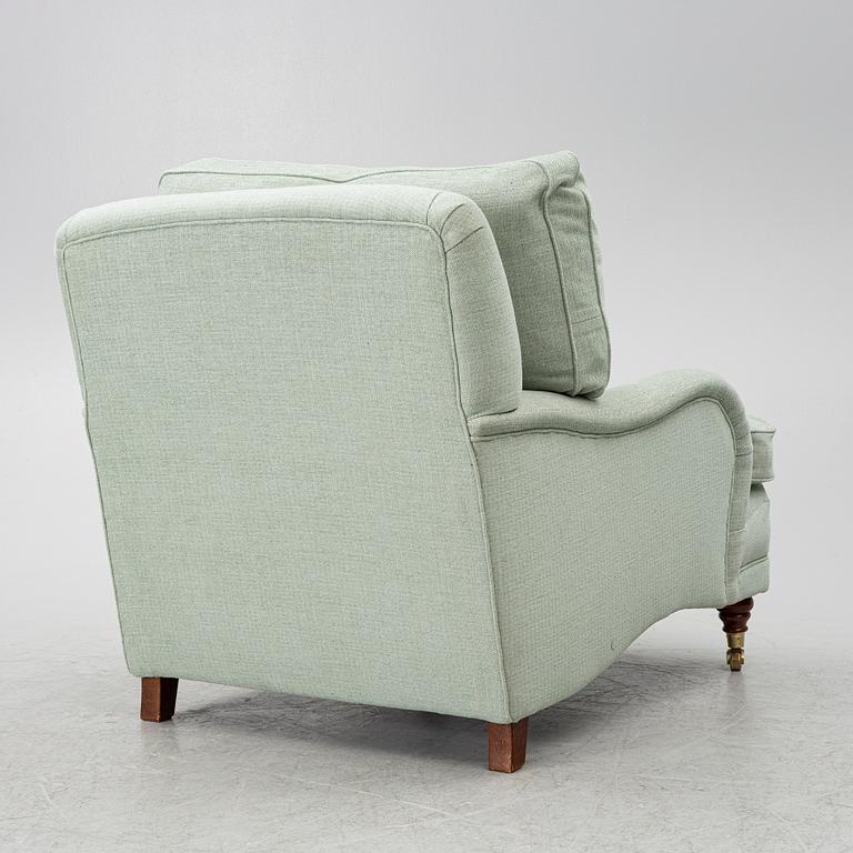 A Howard model armchair, contemporary.