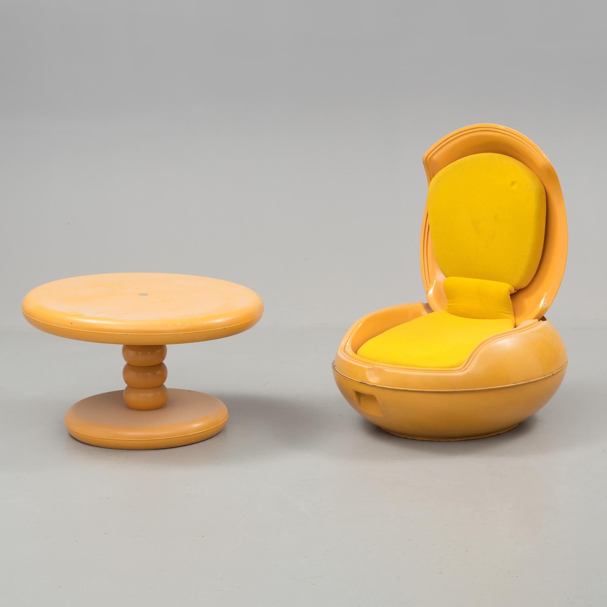 a"Garden egg" armchair and a table by Peter Ghyczy, Reuter Products, designed 1968.