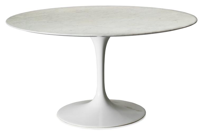 An Eero Saarinen 'Tulip' marble table, Knoll International, USA.