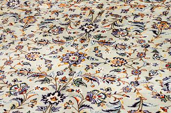 A Keshan rug, 412 x 305 cm.