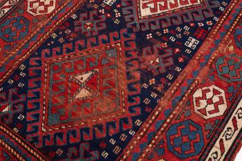 A antique Kazak gallery vcarpet, ca 240 x 120 cm.