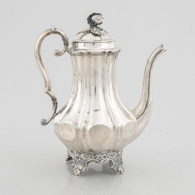 A Swedish Silver Rococo-Revival Coffee Pot, mark of Christian Hammer, Stockholm 1850.