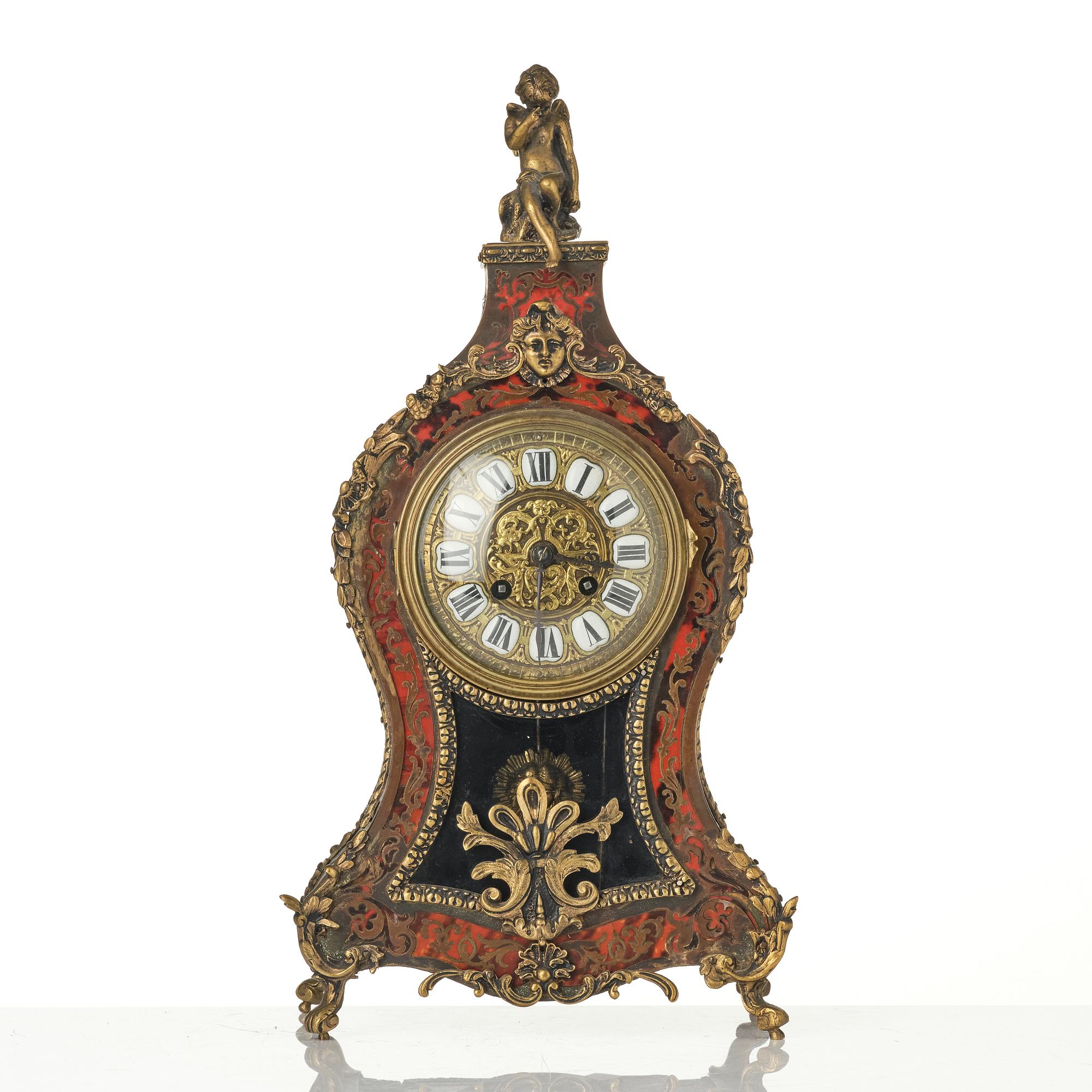 A Rococo-style mantle clock, around 1900.