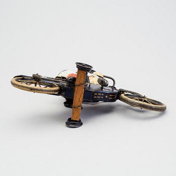 A partially hand painted tinplate Lehmann Halloh motorcycle, Germany. In production 1914-41.