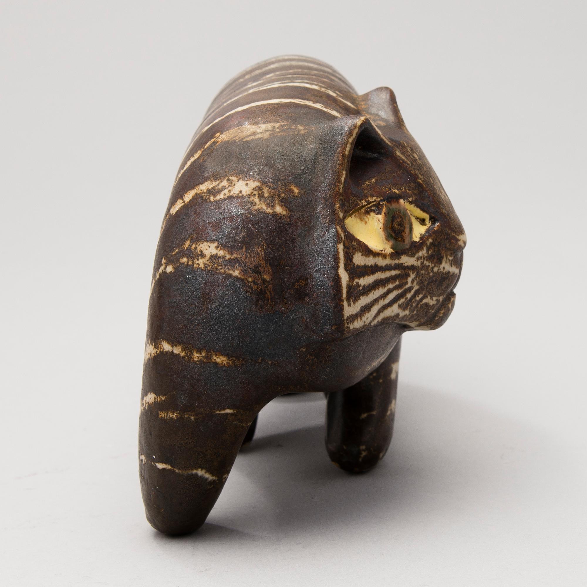 A Ceramic Figurine, signed T Kaasinen Arabia Finland.