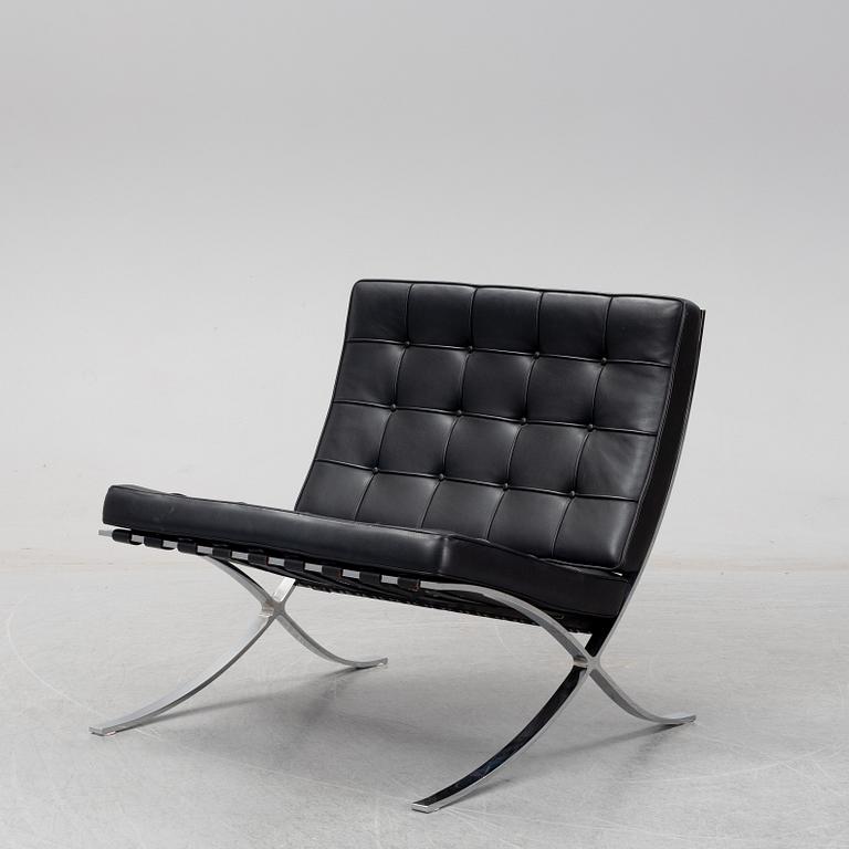 LUDWIG MIES VAN DER ROHE, a 'Barcelona' black leather lounge chair, Knoll Studio.
