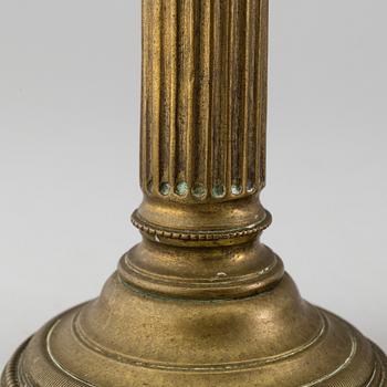 A PAIR OF GUSTAVIAN BRONZE CANDLESTICKS, latter part of the 18th century.