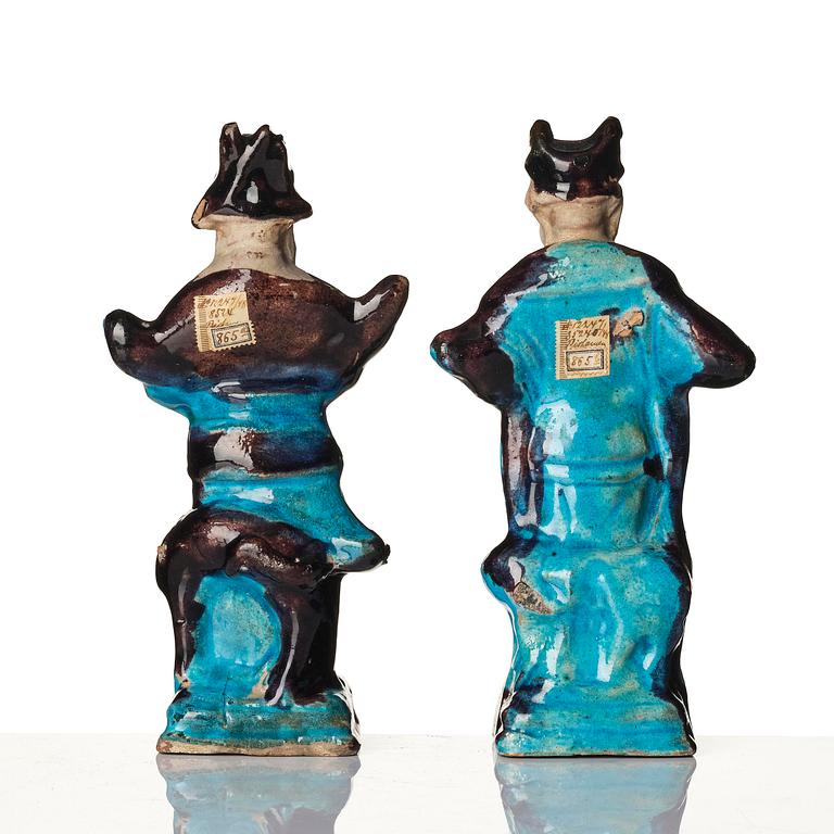 A pair of turquoise and purple glazed figures of guardsmen, Ming dynasty (1368-1644).