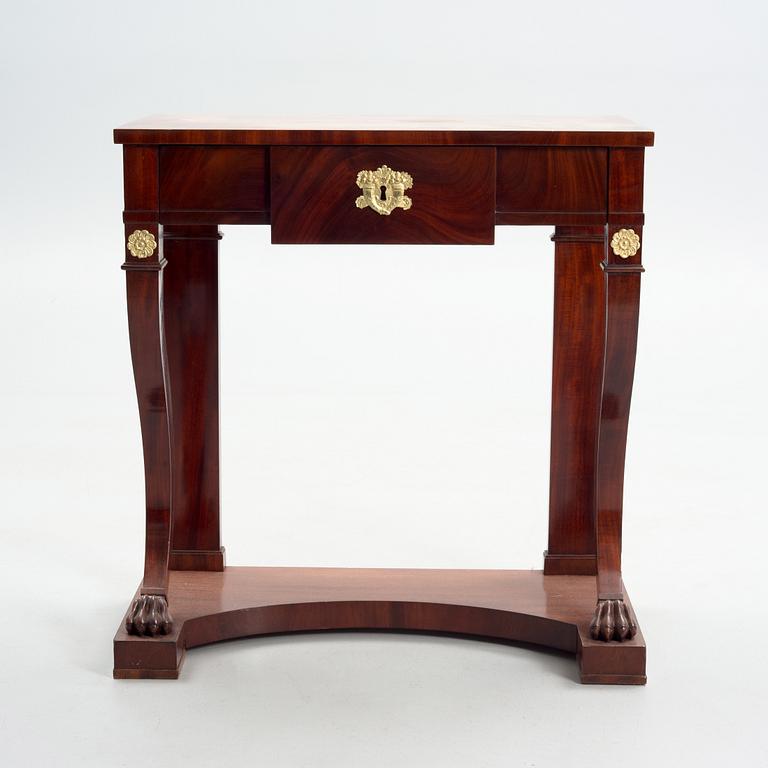 A CONSOLE TABLE, empire, early 19th century.