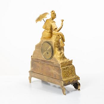A Late Empire table clock, 19th century.