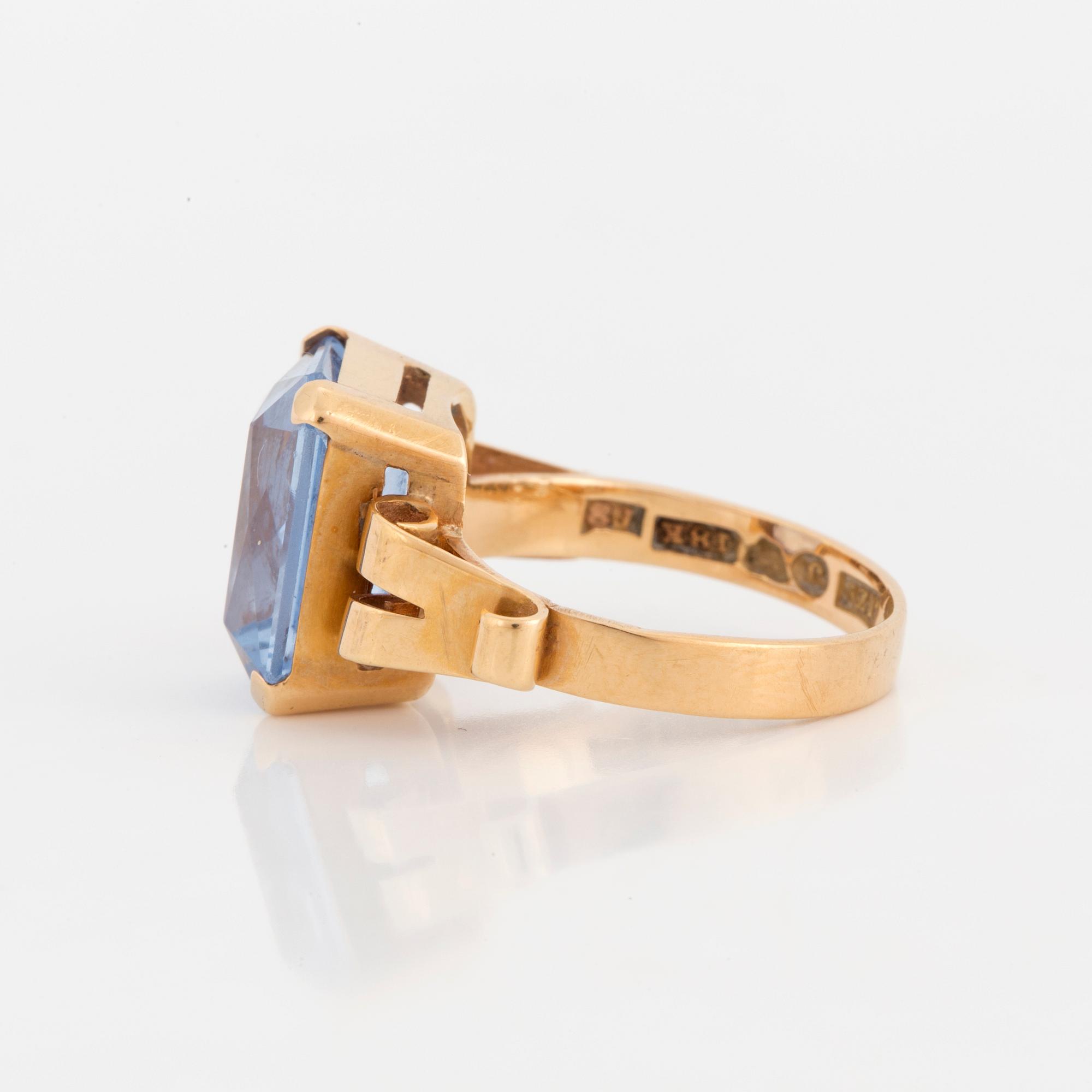 A ring with synthetic blue spinel.