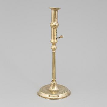 A BRONZE CANDLESTICK, England, 18th century.