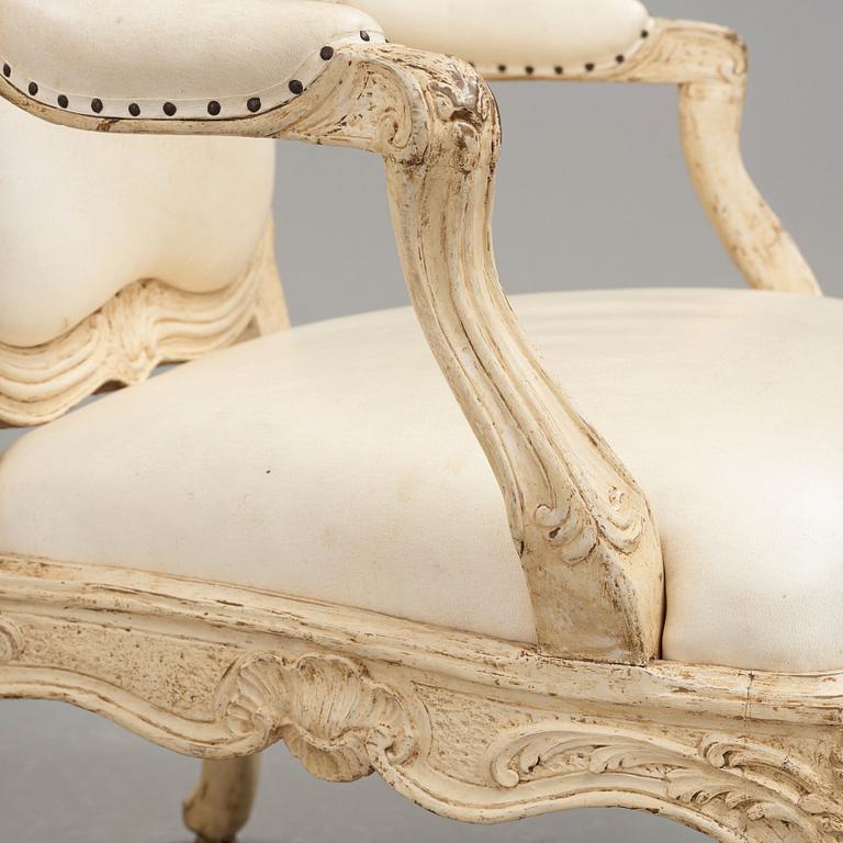 A pair of Swedish Rococo 18th century armchairs attributed to Carl Magnus Sandberg (master in Stockholm 1759-1789).