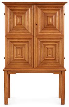 593. An Oscar Nilsson oak cabinet, probably executed by cabinetmaker J Wickman, Stockholm 1940's.