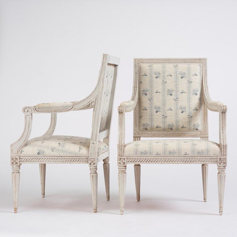 A pair of Gustavian open armchairs by J. Lindgren (master in Stockholm 1770-1800).