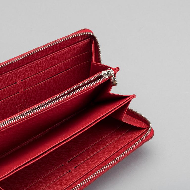 A Louis Vuitton zippy wallet.