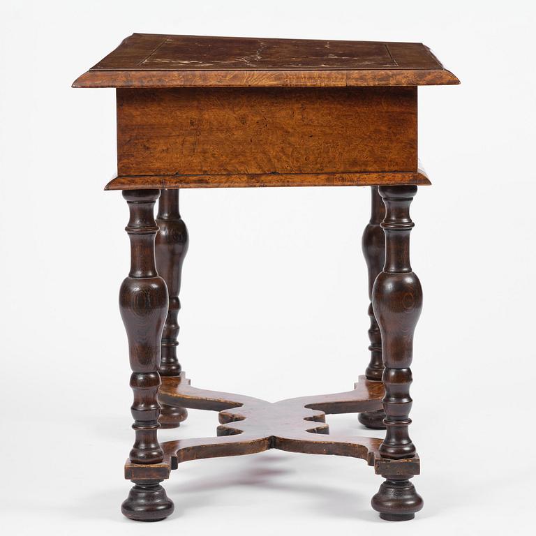 A Swedish late baroque burr-alder table, Stockholm, first part 18th century.