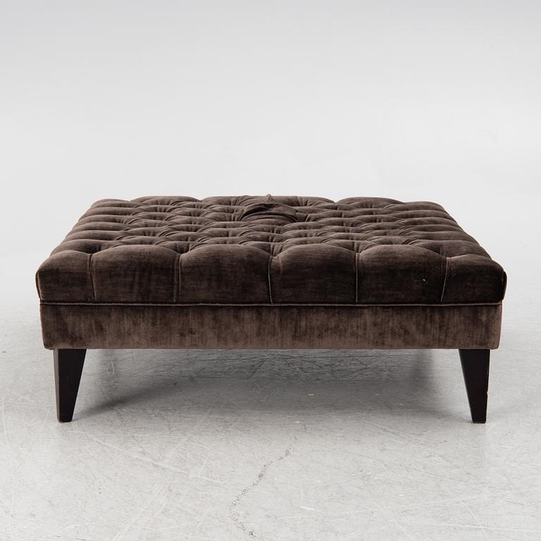 A pouf, contemporary.