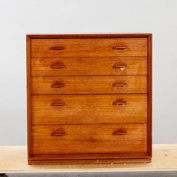 A teak veneered chest of drawers, designed by Olof Pira.