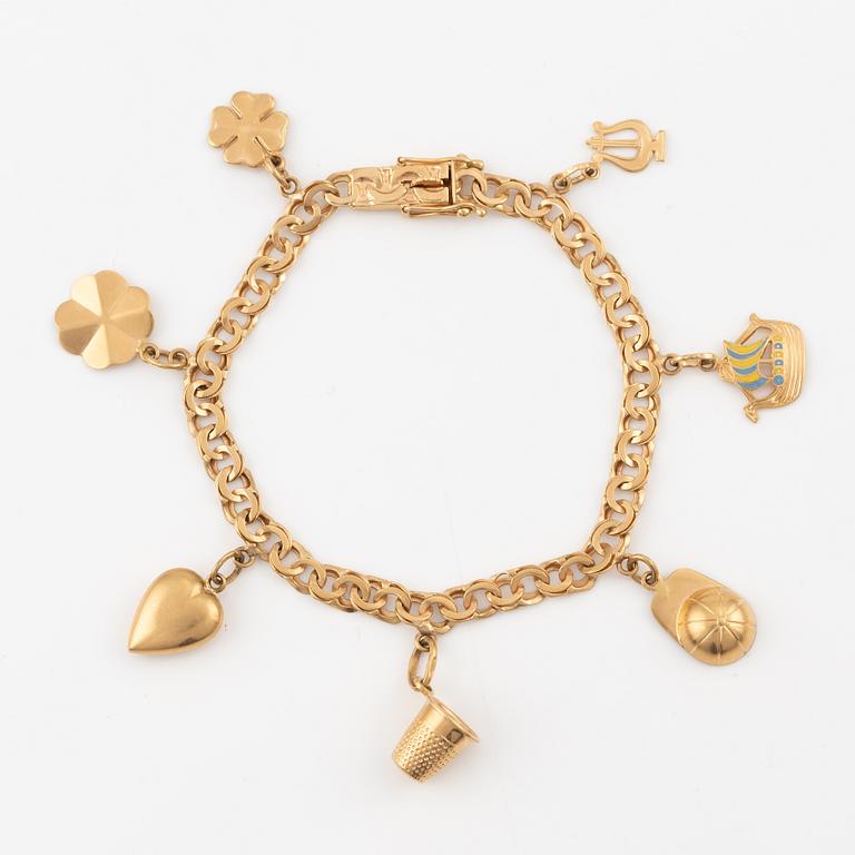 Bracelet, 18K gold, with charms.