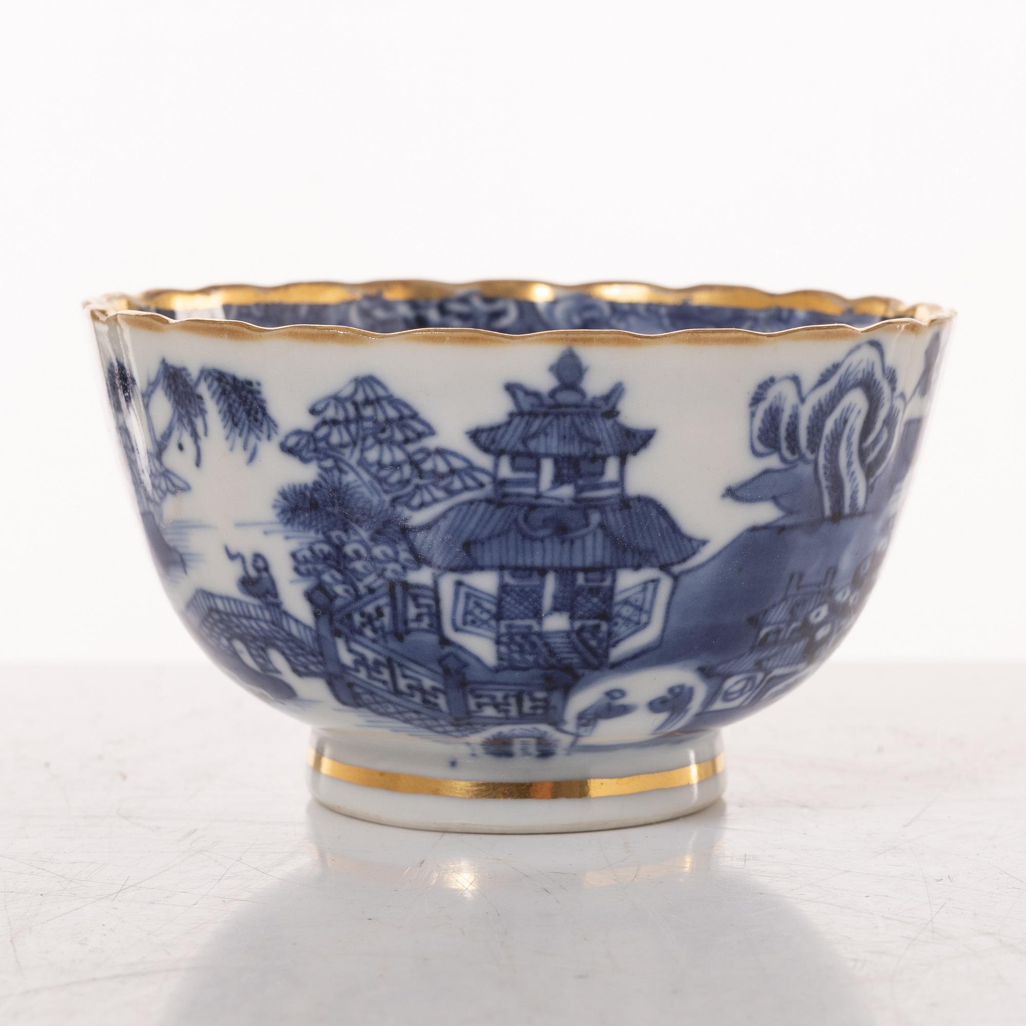 A group  of three serving dishes, a serving bowl, a cup, and seven plates, porcelain, including China 18th century.