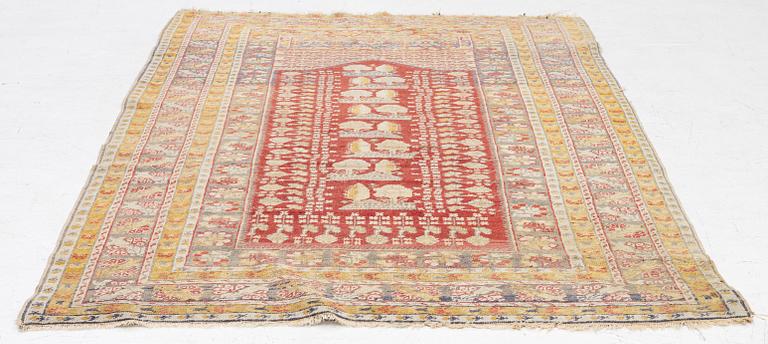 An oriental carpet, c. 195 x 70 cm.