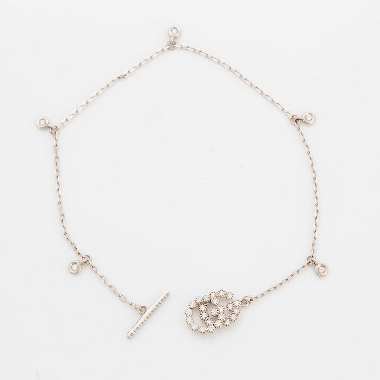 Gucci bracelet set with brilliant-cut diamonds.