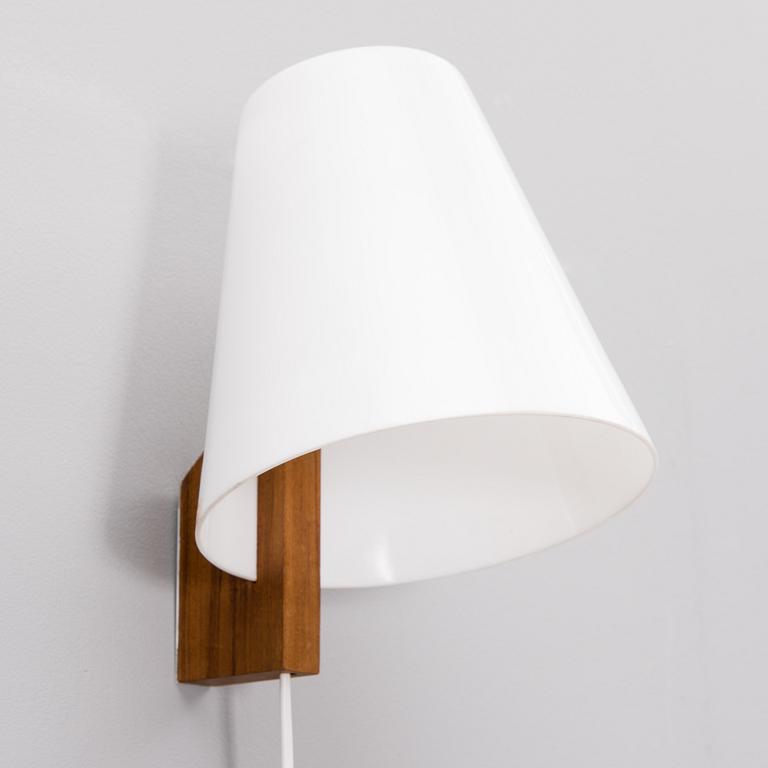 a 1960s wall lamp made by Sanka for Stockmann.