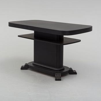 a coffee table from the first half of the 20th century.