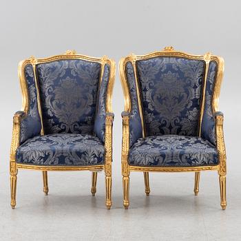 A pair of Louis XVI style armchairs, late 20th Century.