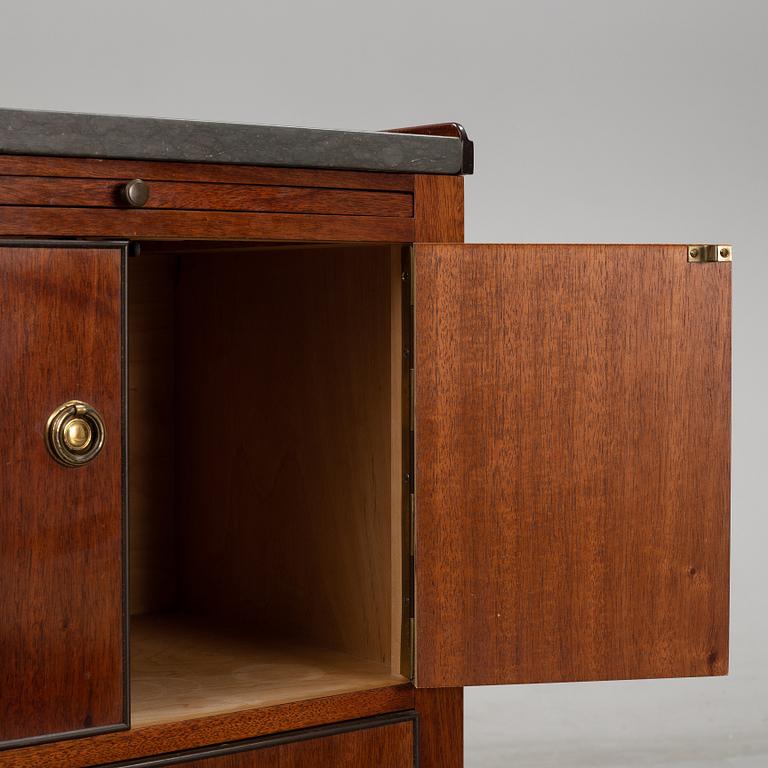 A pair of mahgany veneered bedside cabinets, early 20th Century.