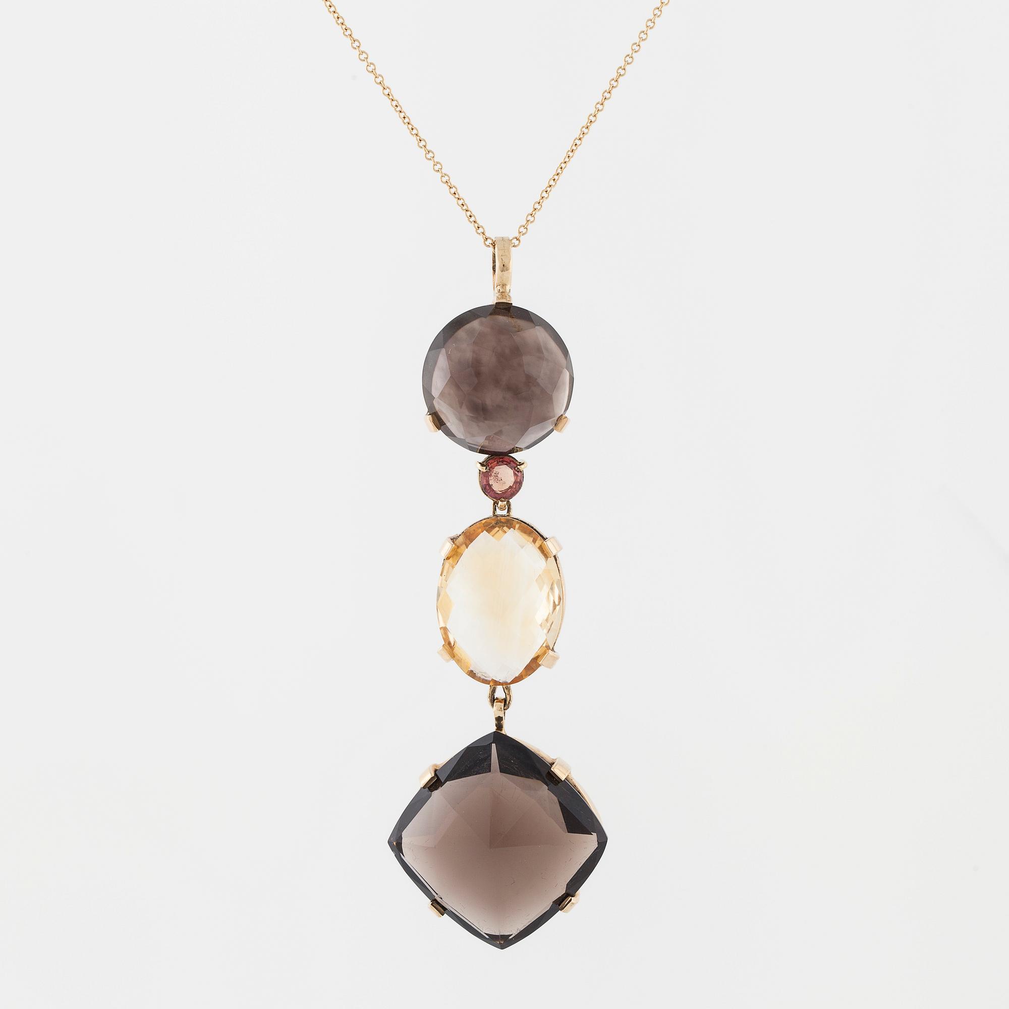 A smokey quartz and citrine pendant.