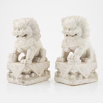 A pair of Chinese sculpture of buddhist lions, 20th Century.