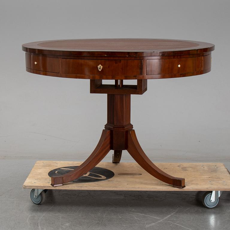 A revolving table, mid 19th century.