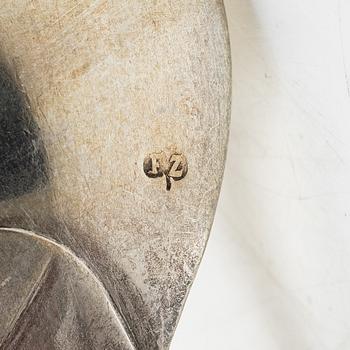 Two silver serving spoons with pseudo-marks, around the year 1900.